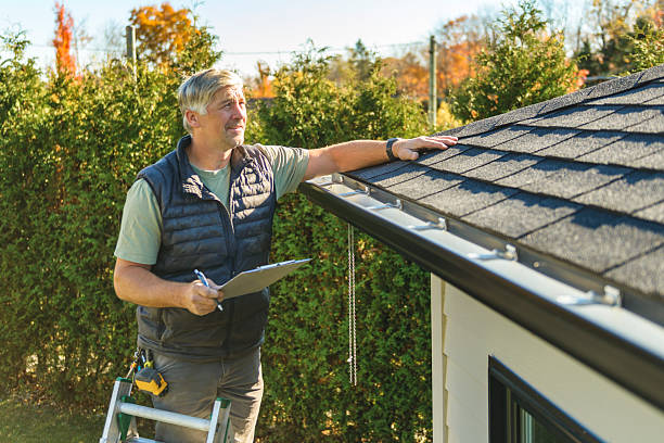 Professional Flat Roof Repair technician working in Hemlock, IN